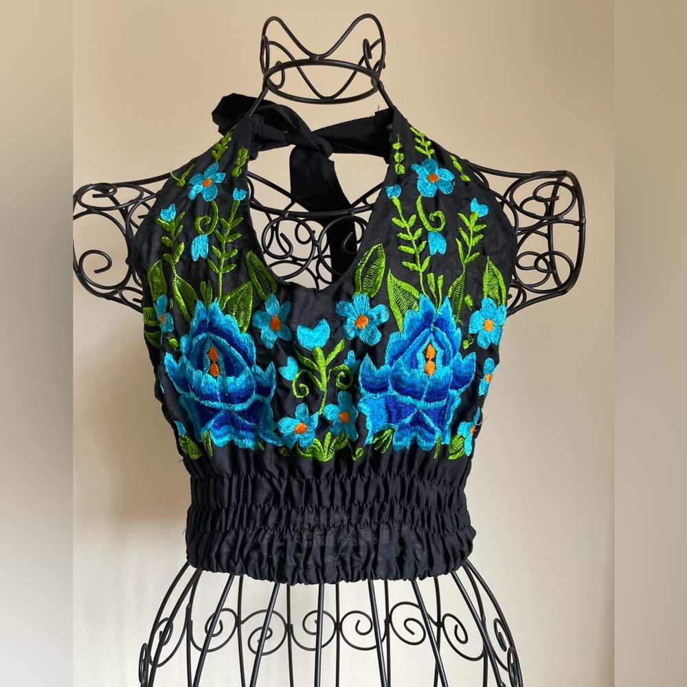 Halter top with embroidery in black , green and blue
